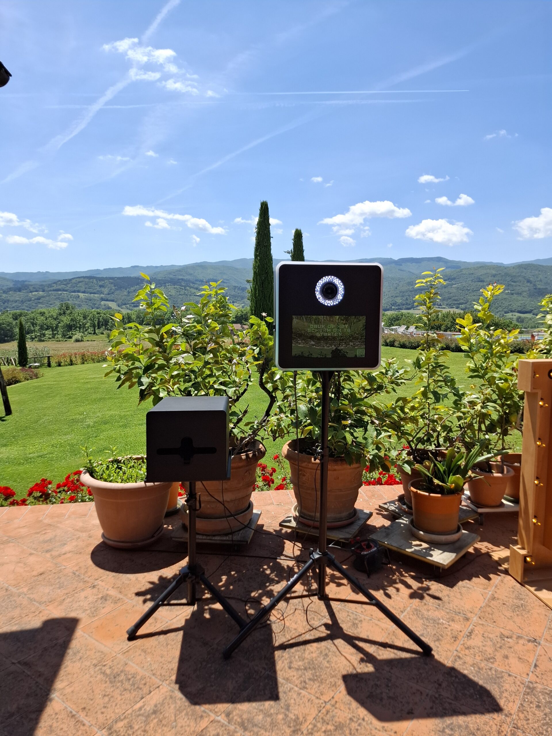 Photobooth overlooking the Tuscan hills at an Italian wedding venue